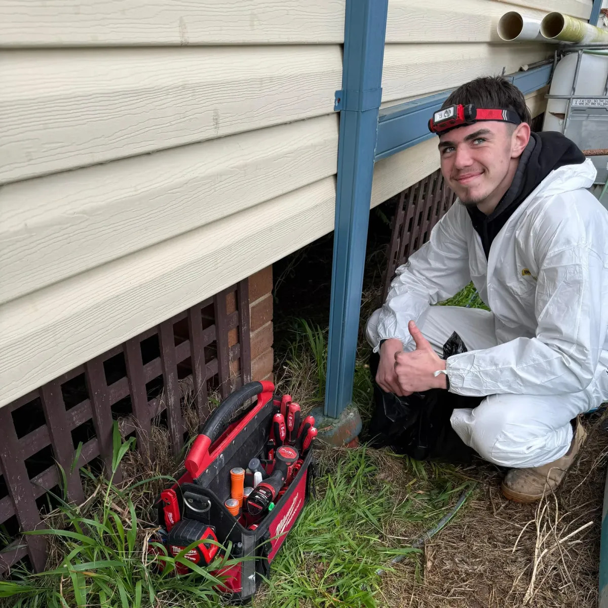 Antons technician preparing professional tools for a residential leak inspection